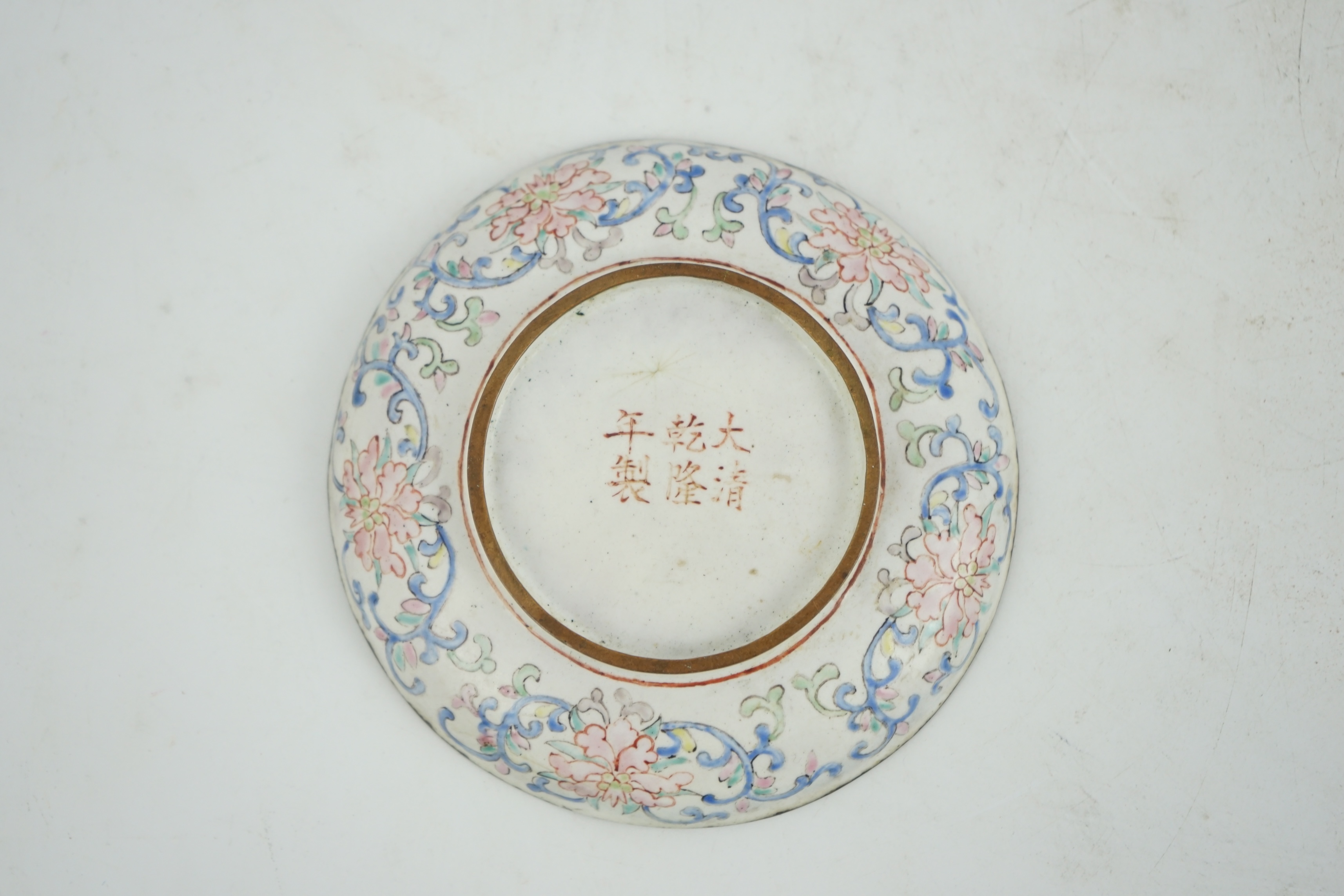 A Chinese Guangzhou enamel saucer dish, 19th century